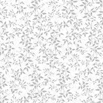 A fabric with a Christmas print featuring leaves in silver and white.