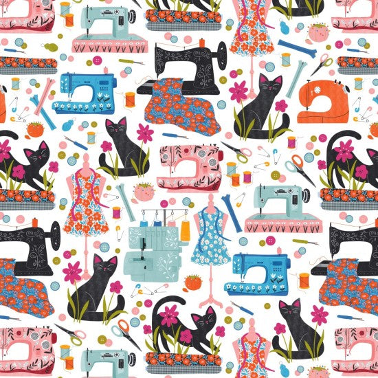 A Quilt fabric design featuring black cats and sewing machines on an off-white background.