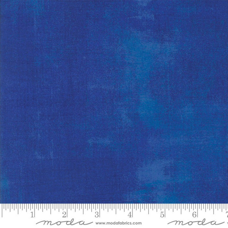 A swatch of blue textured-effect blender fabric.