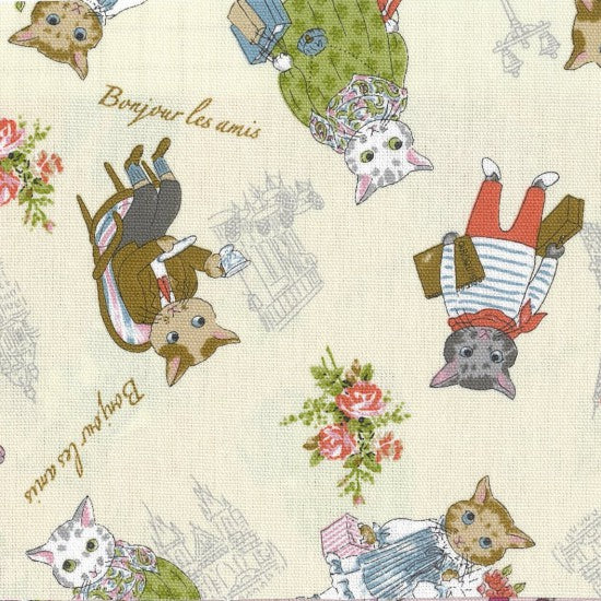 Cotton fabric with a design of cats wearing French clothing on a cream background, with text and floral designs.