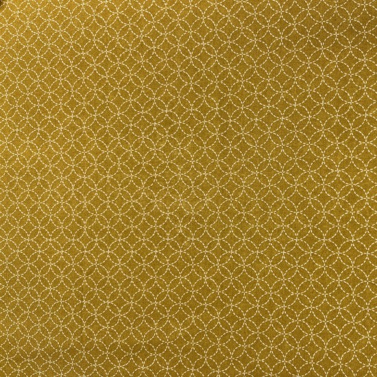 A swatch of Quilt fabric featuring a Japanese mini design with a geometric print on a mustard yellow background.