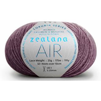 Ball of mauve yarn with a 'Zealana Air Lace' label on a white background