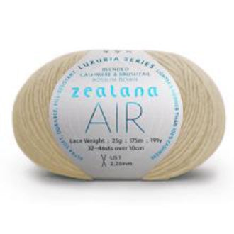 Ball of creamy white yarn with a 'Zealana Air Lace' label on a white background