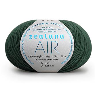 Ball of dark spruce green yarn with a 'Zealana Air Lace' label on a white background
