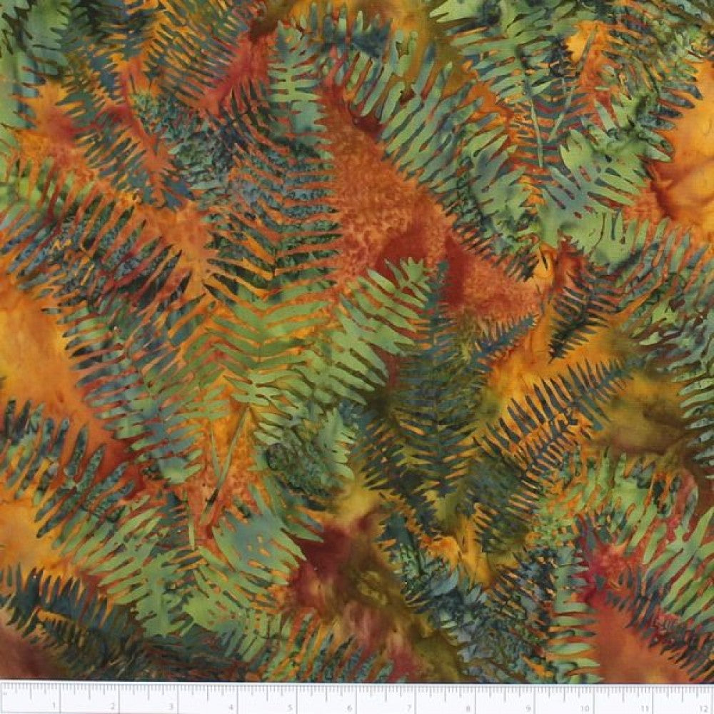 New Zealand designed quilt fabric with ferns on a textured background in blues greens pinks and oranges