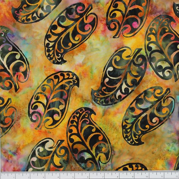 New Zealand designed quilt fabric with Maori style leaf design in green orange pink and yellow
