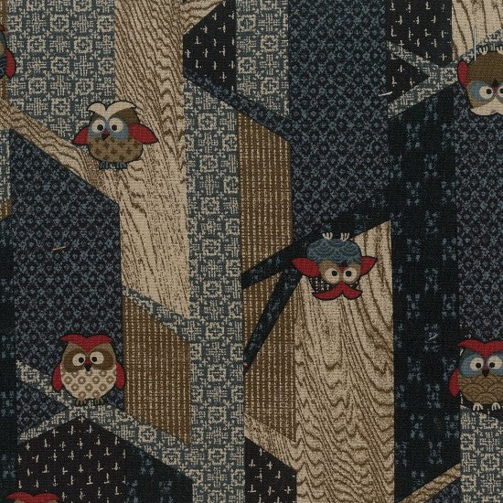 A fabric with a traditional Japanese design featuring multi-colored owls on a navy and beige colored background.
