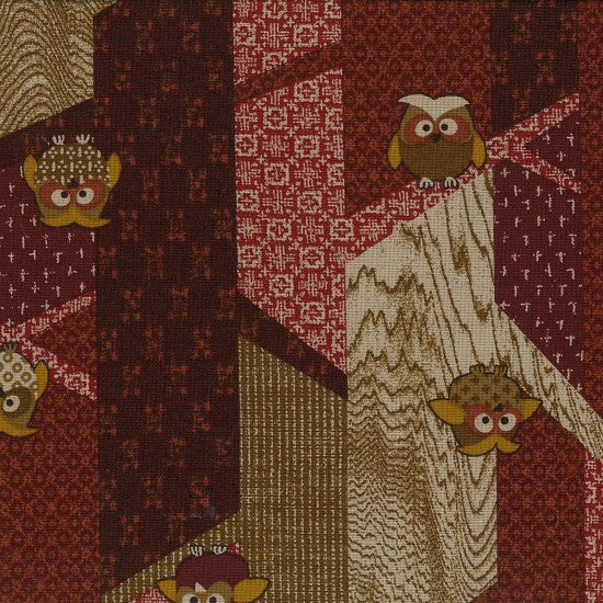 A fabric with a traditional Japanese design featuring multi-colored owls on a rust and red background with geometric Quilt Fabrics.