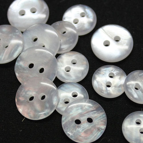 Buttons - Round Polyester 11.5 mm with a slight swirl pattern