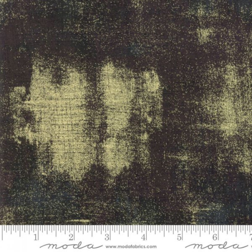 A swatch of quilt fabric with metallic expesso color.