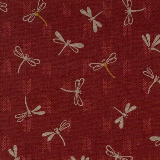 Fabric with a traditional Japanese design featuring dragonflies on a red background.