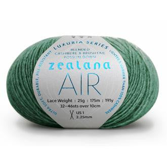 Ball of pastel mint yarn with a 'Zealana Air Lace' label on a white background