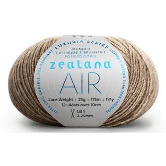 Ball of undyed, naturally coloured  yarn with a 'Zealana Air Lace' label on a white background