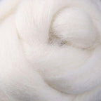Close-up sample of white unspun fibre for use in spinning or felting