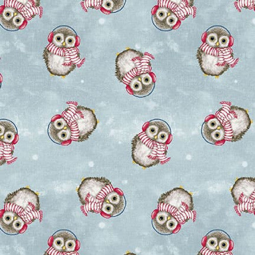 Magical Menagerie Tossed Owls - Owls in Christmas Gear on a Snowy Blue Background