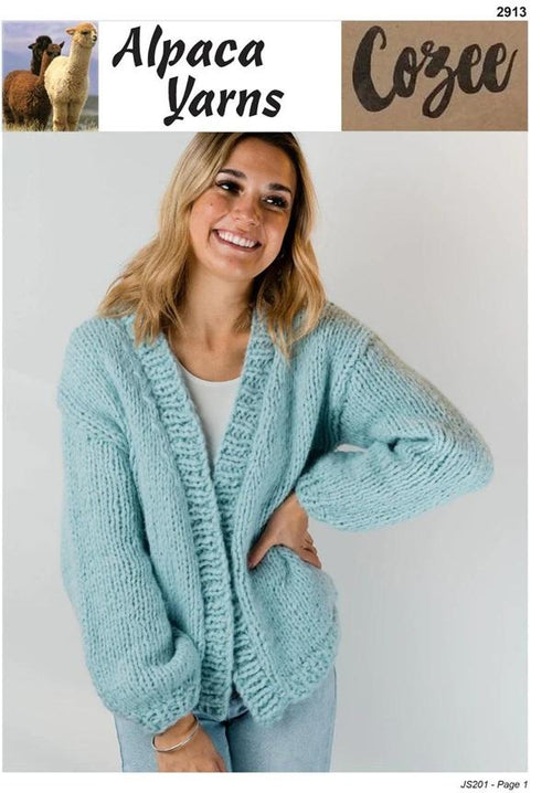 Woman wearing a light blue knitted cardigan made with super chunky yarn