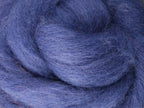 Closeup of New Zealand unspun fibre in colour Blueberry