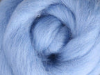 Closeup of New Zealand unspun fibre in colour Bubblegum