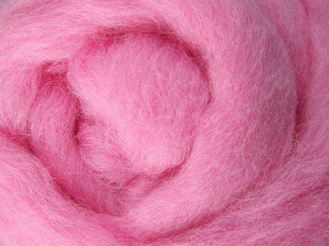 Closeup of New Zealand unspun fibre in colour Candy Floss