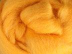Closeup of New Zealand unspun fibre in colour Cheesecake