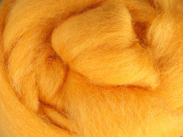 Closeup of New Zealand unspun fibre in colour Cheesecake