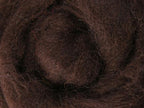Closeup of New Zealand unspun fibre in colour Chocolate
