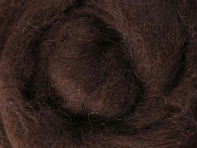 Closeup of New Zealand unspun fibre in colour Chocolate