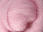 Closeup of New Zealand unspun fibre in colour Cupcake