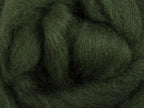 Closeup of New Zealand unspun fibre in colour Fern Green