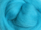 Closeup of New Zealand unspun fibre in colour Fluro Blue