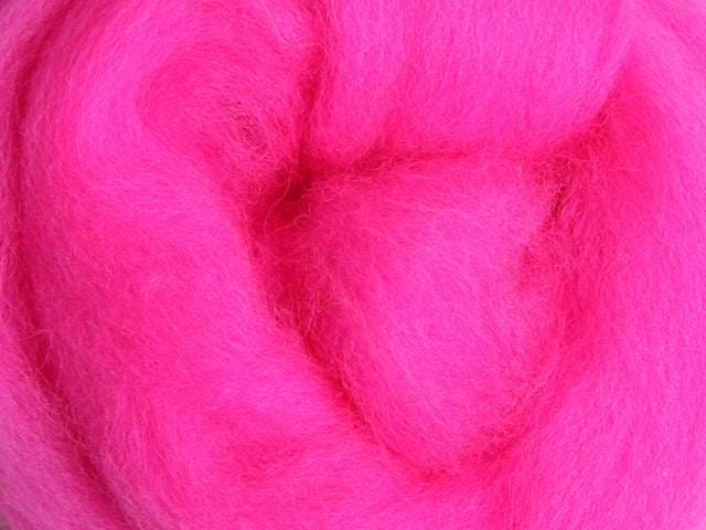 Closeup of New Zealand unspun fibre in colour Fluro Pink
