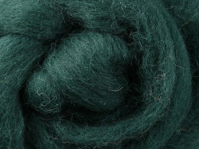 Closeup of New Zealand unspun fibre in colour Green Tea