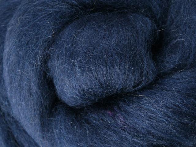 Closeup of New Zealand unspun fibre in colour Indigo