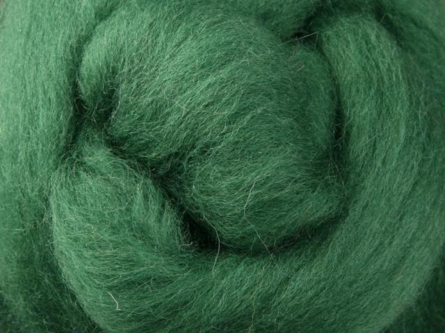 Closeup of New Zealand unspun fibre in colour Kiwifuit