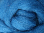 Closeup of New Zealand unspun fibre in colour Lagoon