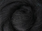 Closeup of New Zealand unspun fibre in colour Liquorice
