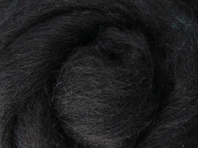 Closeup of New Zealand unspun fibre in colour Liquorice