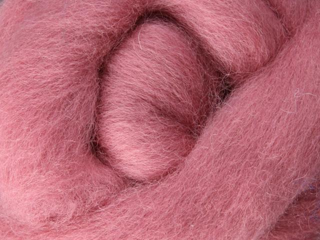 Closeup of New Zealand unspun fibre in colour Marshmallow