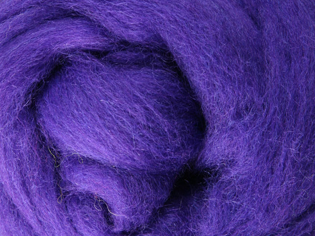 Closeup of New Zealand unspun fibre in colour Purple