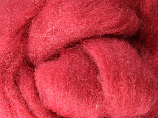 Closeup of New Zealand unspun fibre in colour Strawberry Shortcake