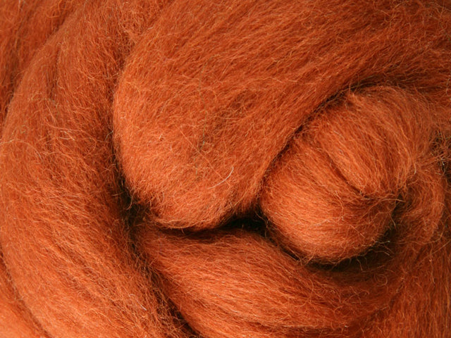 Closeup of New Zealand unspun fibre in colour Toffee