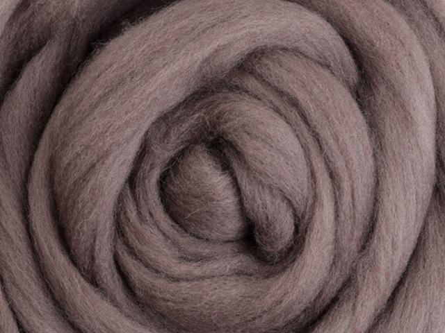 Closeup of New Zealand unspun fibre in colour Truffle