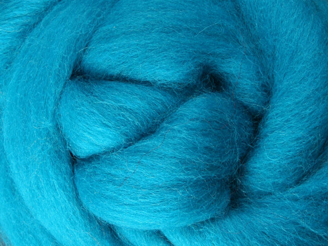 Closeup of New Zealand unspun fibre in colour Turquoise