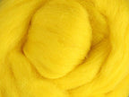 Closeup of New Zealand unspun fibre in colour Yellow