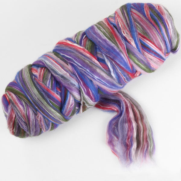Picture of a batt of New Zealand Merino and Silk unspun fibre dyed in multi-colour jewel tones purples greens and blues