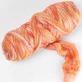 Picture of a batt of New Zealand Merino and Silk unspun fibre dyed in multi-colour oranges