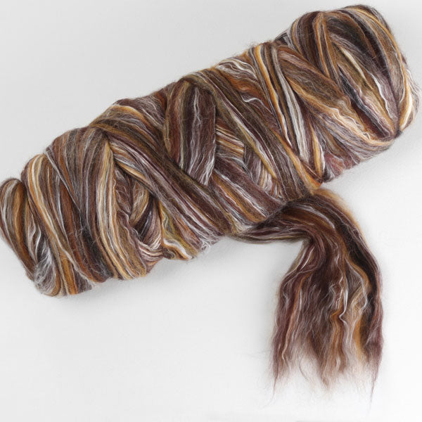 Picture of a batt of New Zealand Merino and Silk unspun fibre dyed in multi-colour spice browns