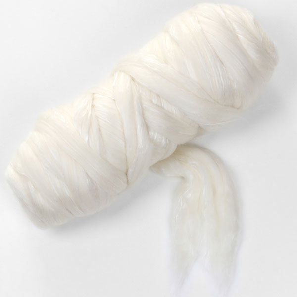 Picture of a batt of New Zealand Merino and Silk unspun fibre dyed in multi-colour vanilla off-whites
