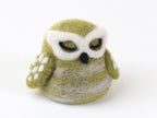 Sample of a needle felted New Zealand Little Green Owl on a white background