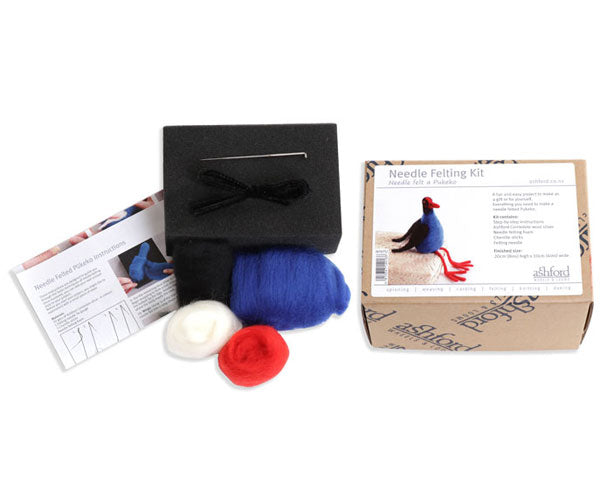 Needle felting kit with materials and instructions on a white background